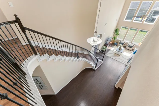 a view of a balcony with furniture