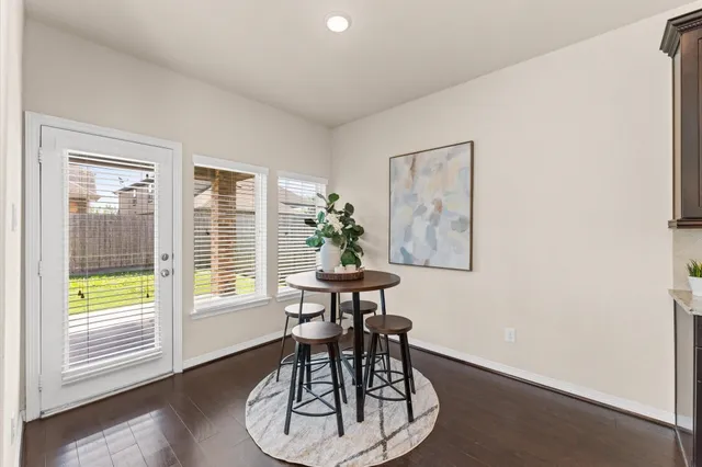 a table and chairs in a room