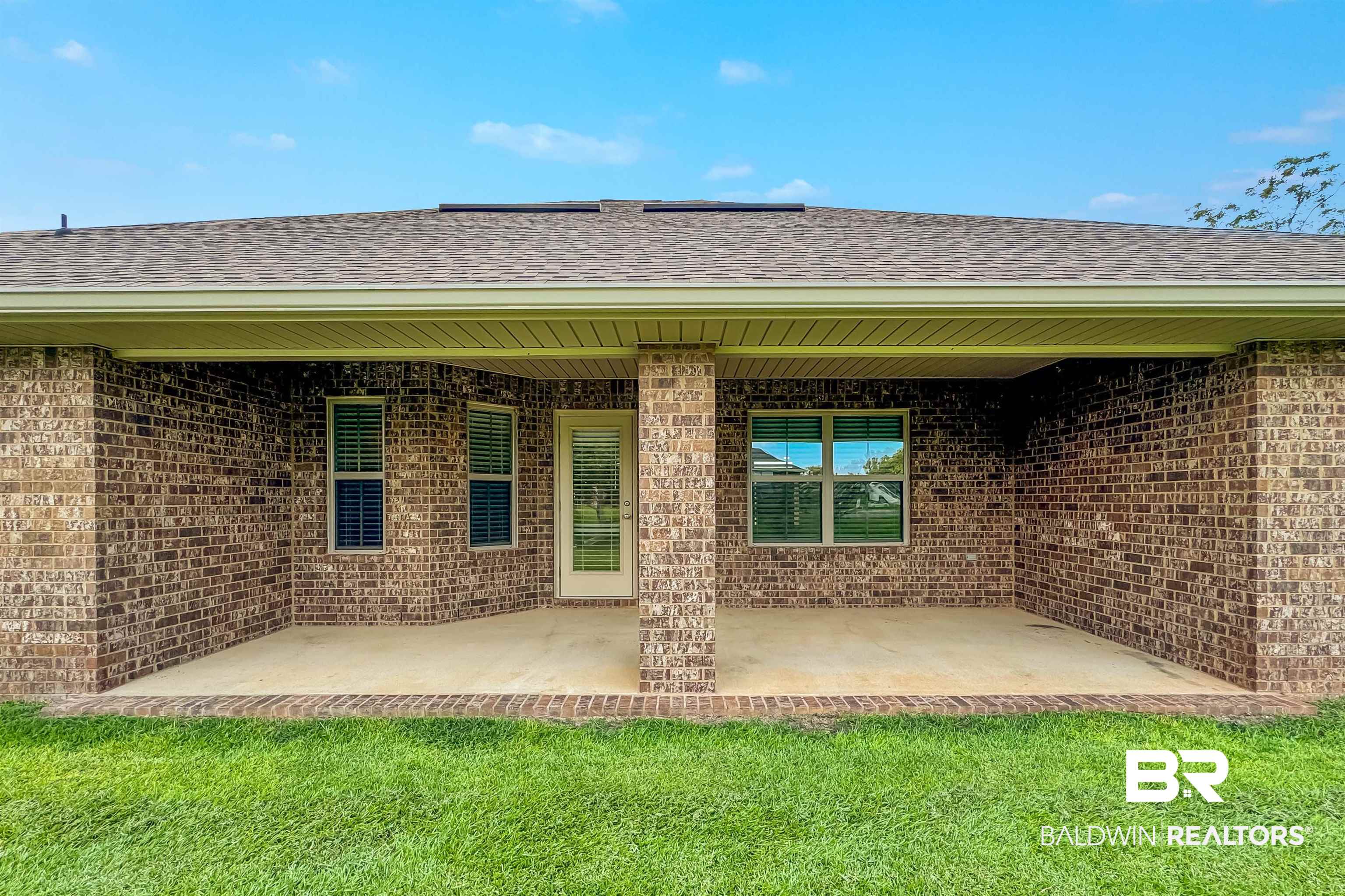 13155 Wishbone Court Foley, AL 36535 - Photo 33 of 39 Rear view of property with a patio and a yard