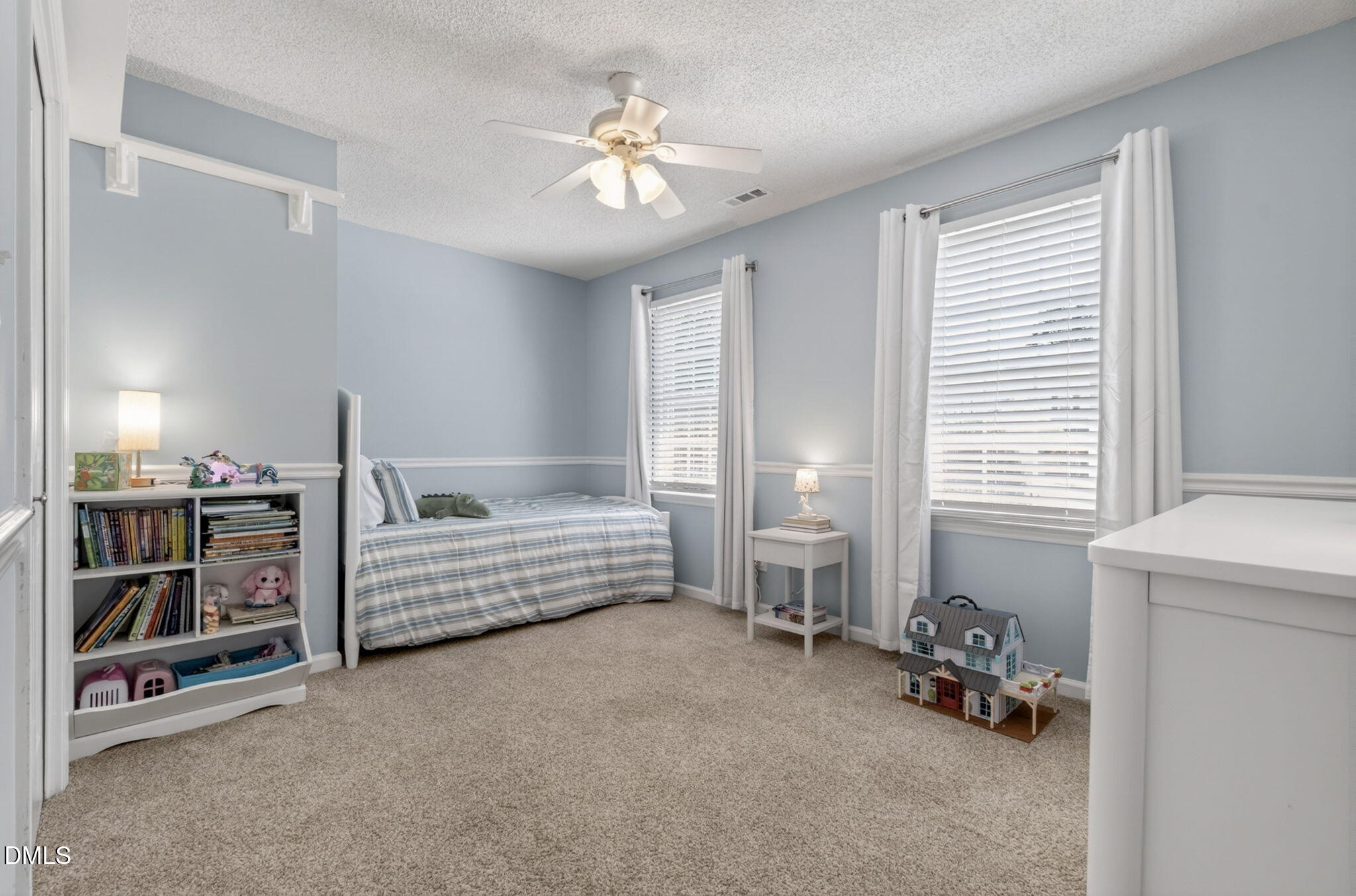12113 Townmeade Court Raleigh, NC 27613 - Photo 30 of 39 Second bedroom with natural light.