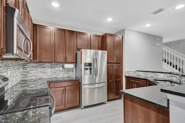 $475,000 | 4749 Grand Cypress Circle North, Coconut Creek, FL 33073