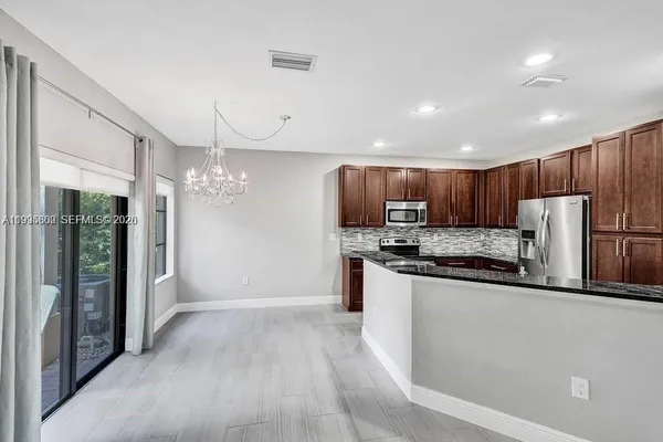 $475,000 | 4749 Grand Cypress Circle North, Coconut Creek, FL 33073