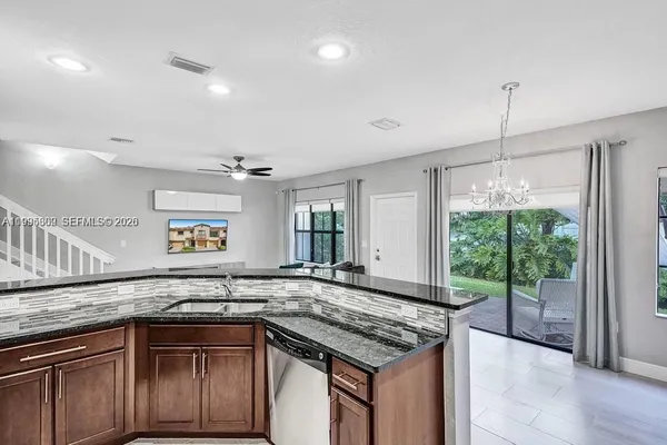 $475,000 | 4749 Grand Cypress Circle North, Coconut Creek, FL 33073