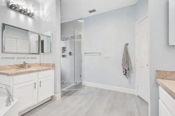 $475,000 | 4749 Grand Cypress Circle North, Coconut Creek, FL 33073