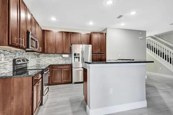 $475,000 | 4749 Grand Cypress Circle North, Coconut Creek, FL 33073