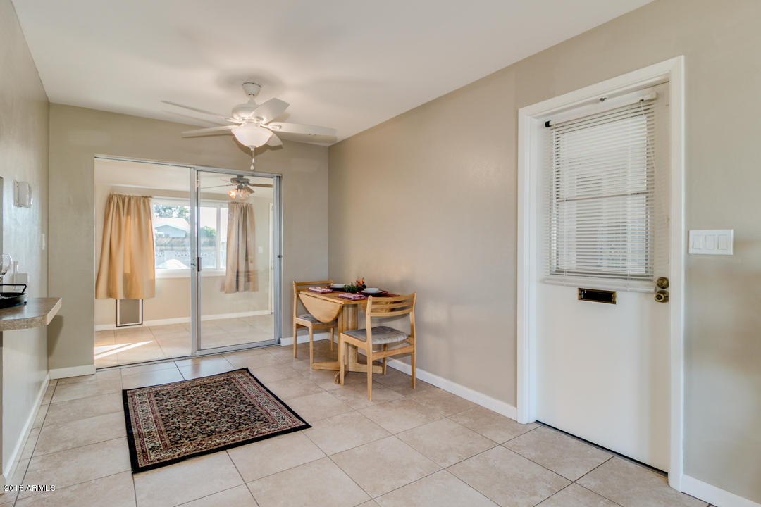 5209 Casper Road Mesa, AZ 85205 - Photo 13 of 28 Dining Area Leads to Arizona Room