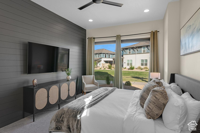 5367 Cyan Lane St. George, UT 84790 - Photo 7 of 36 Carpeted bedroom featuring wood walls, a ceiling fan, recessed lighting, and access to outside