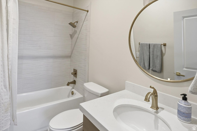 534 East Fish Hatchery Road Mantua, UT 84324 - Photo 38 of 87 Bathroom featuring vanity and shower / tub combo with curtain