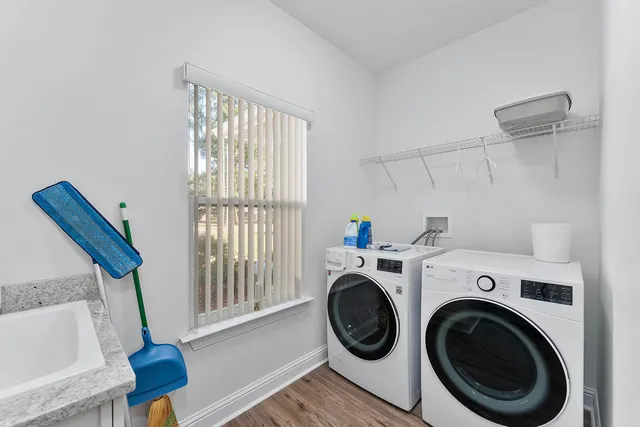 a view of storage and utility room with washer and dryer