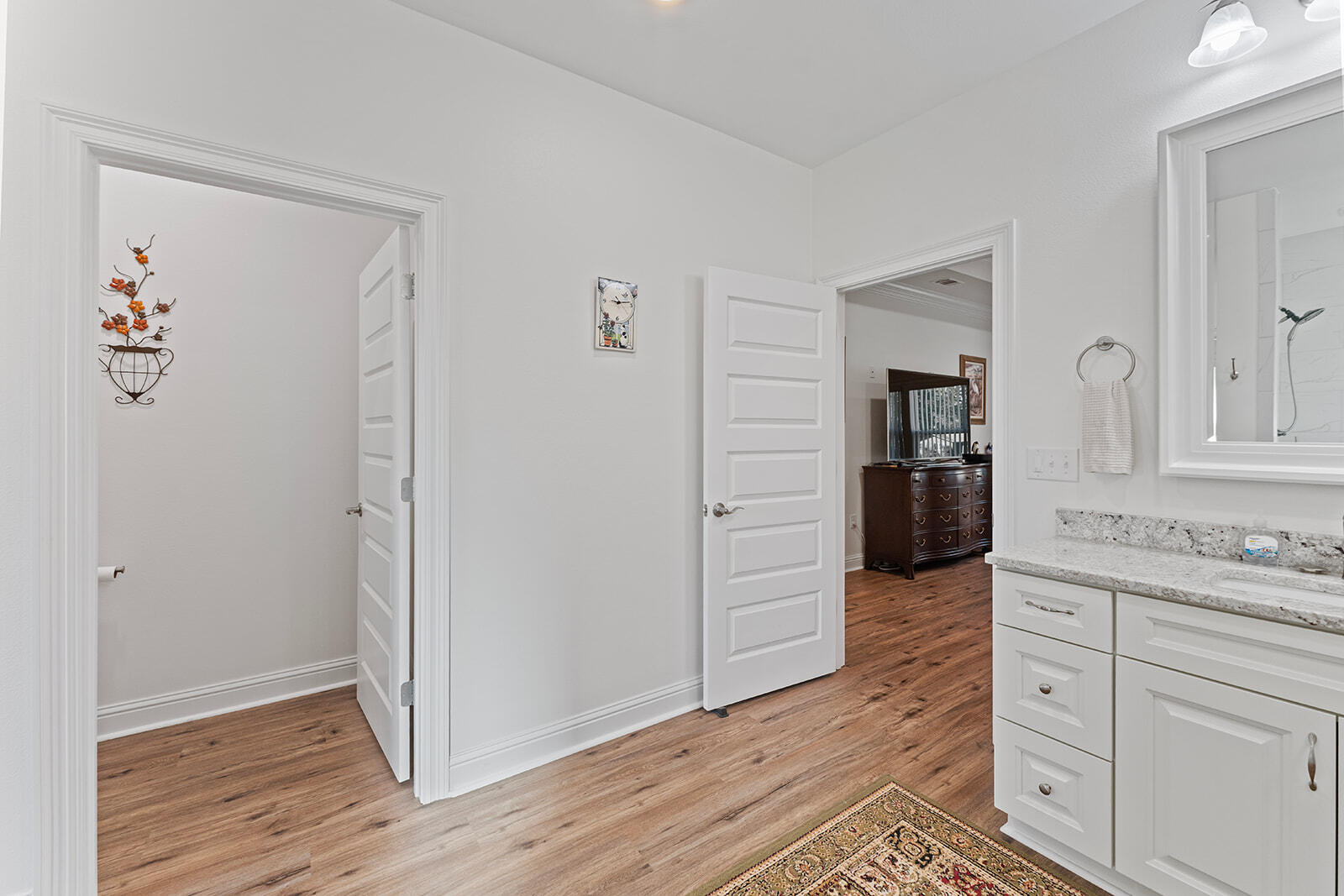 2944 Barton Road Crestview, FL 32539 - Photo 12 of 44 wooden floor and kitchen view with wooden floor