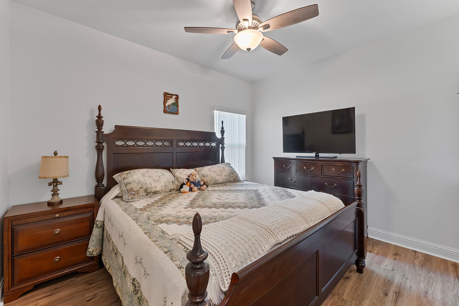 2944 Barton Road Crestview, FL 32539 - Photo 19 of 42 a bedroom with a bed and a tv