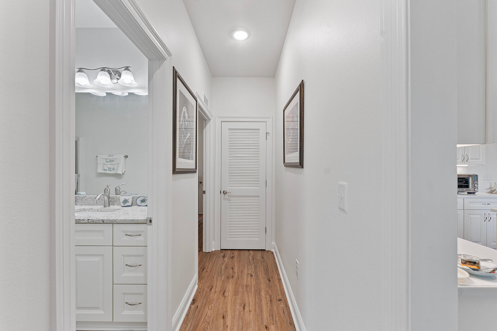 2944 Barton Road Crestview, FL 32539 - Photo 24 of 44 a bathroom with a sink mirror and a shower