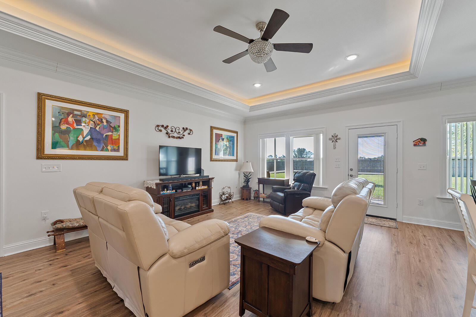 2944 Barton Road Crestview, FL 32539 - Photo 24 of 42 a living room with furniture and a wooden floor