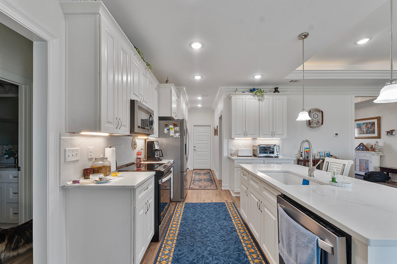 2944 Barton Road Crestview, FL 32539 - Photo 29 of 42 a large kitchen with stainless steel appliances lots of counter space and a sink