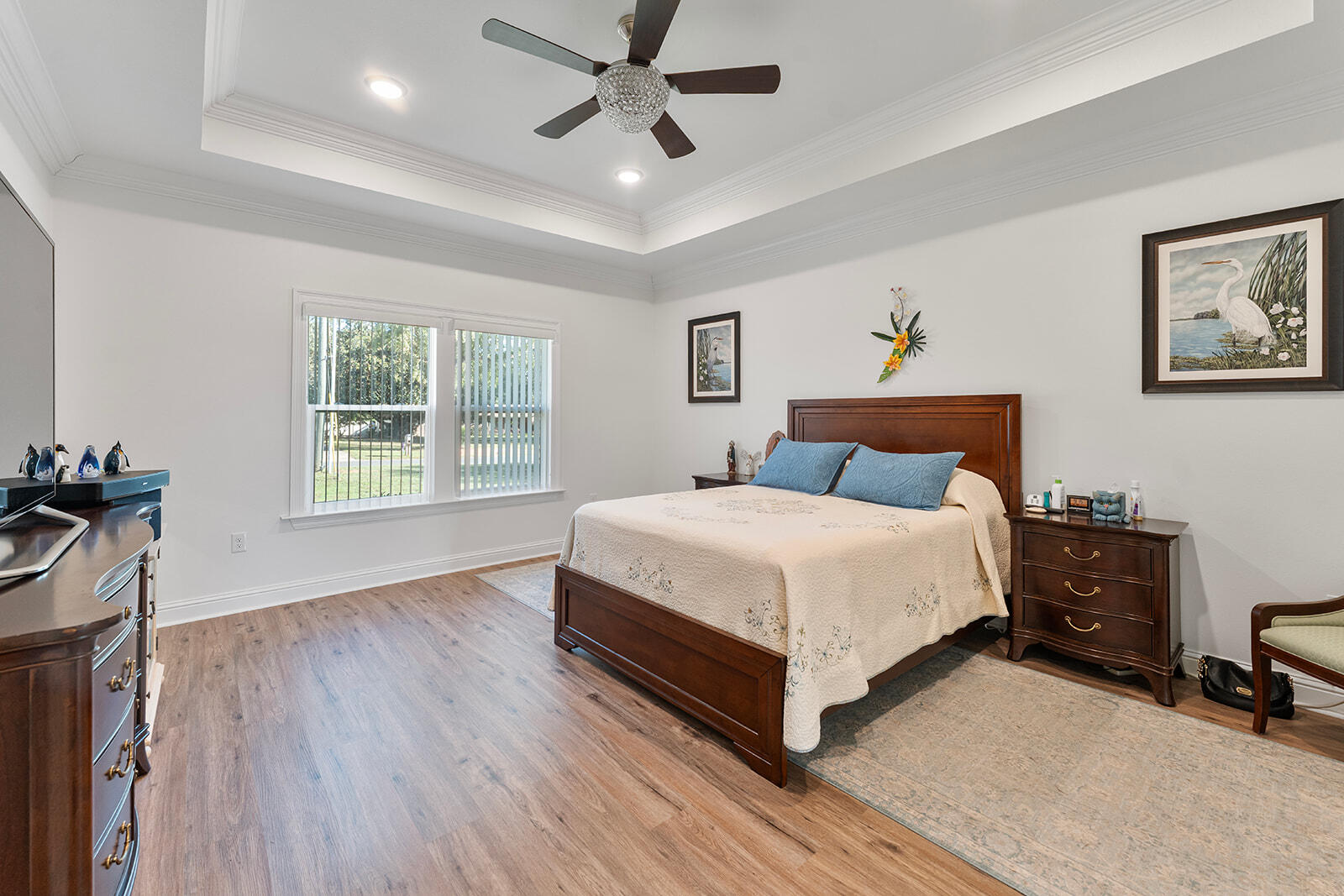 2944 Barton Road Crestview, FL 32539 - Photo 3 of 44 a bedroom with a bed and a window