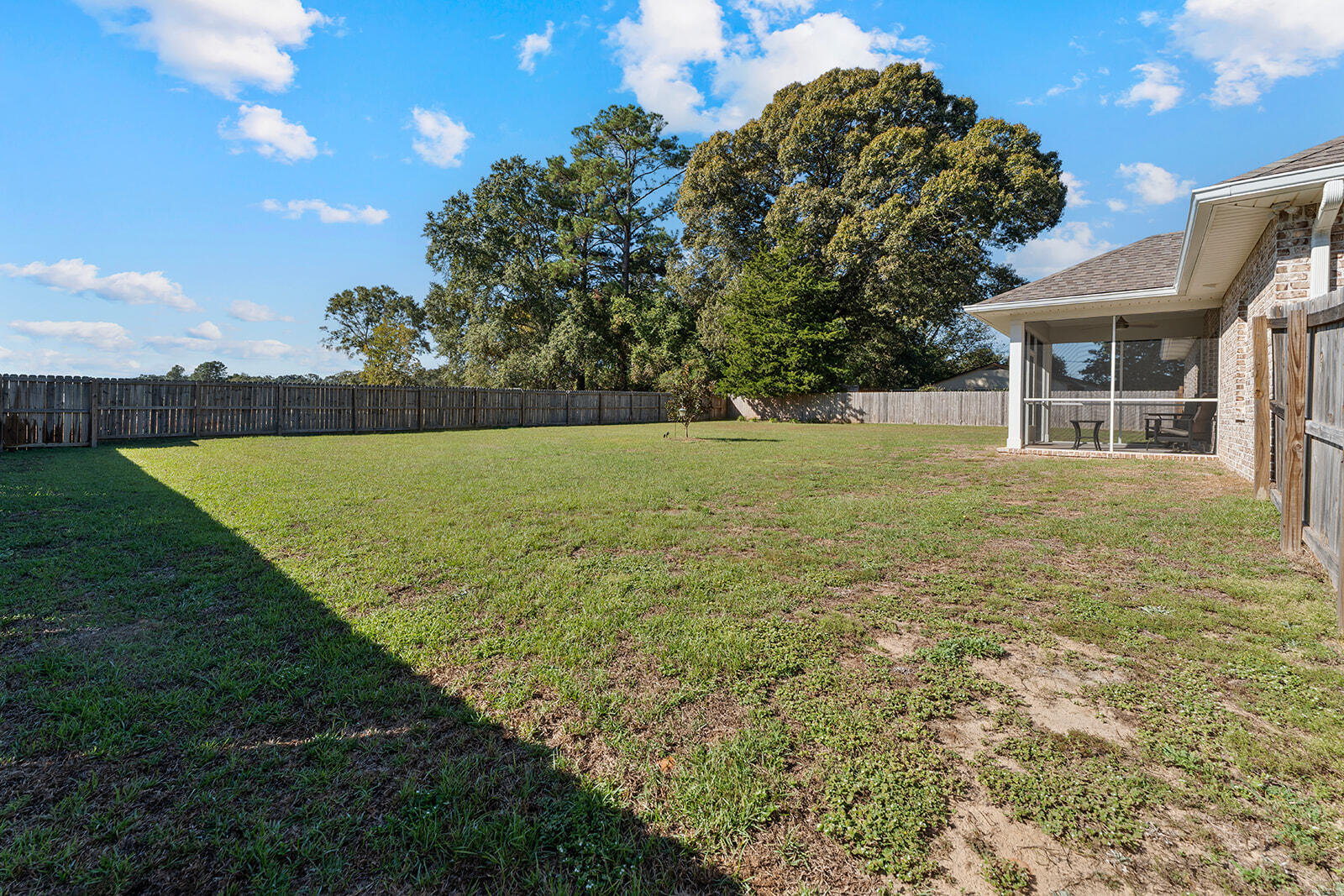 2944 Barton Road Crestview, FL 32539 - Photo 34 of 44 a view of a house with a yard