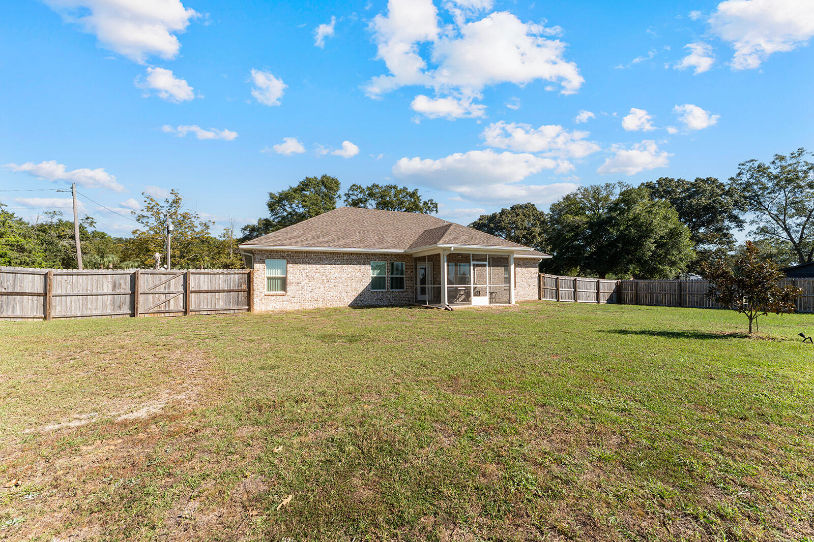 2944 Barton Road Crestview, FL 32539 - Photo 38 of 44 a front view of a house with a yard