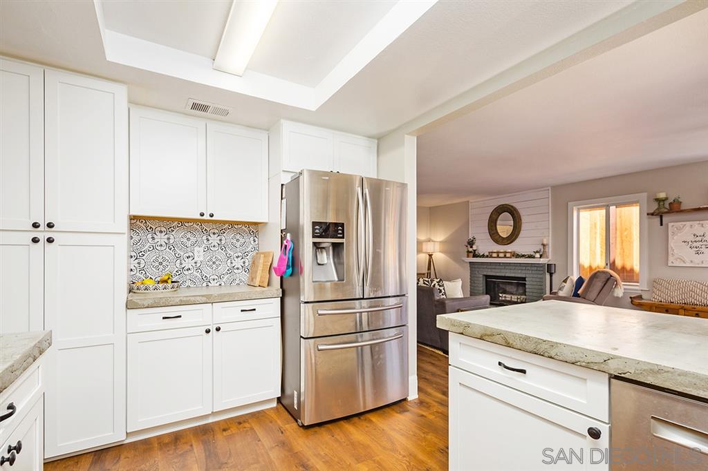 39932 North General Kearny Road Temecula, CA 92591 - Photo 12 of 25 Lovely new cabinets and refrigerator.