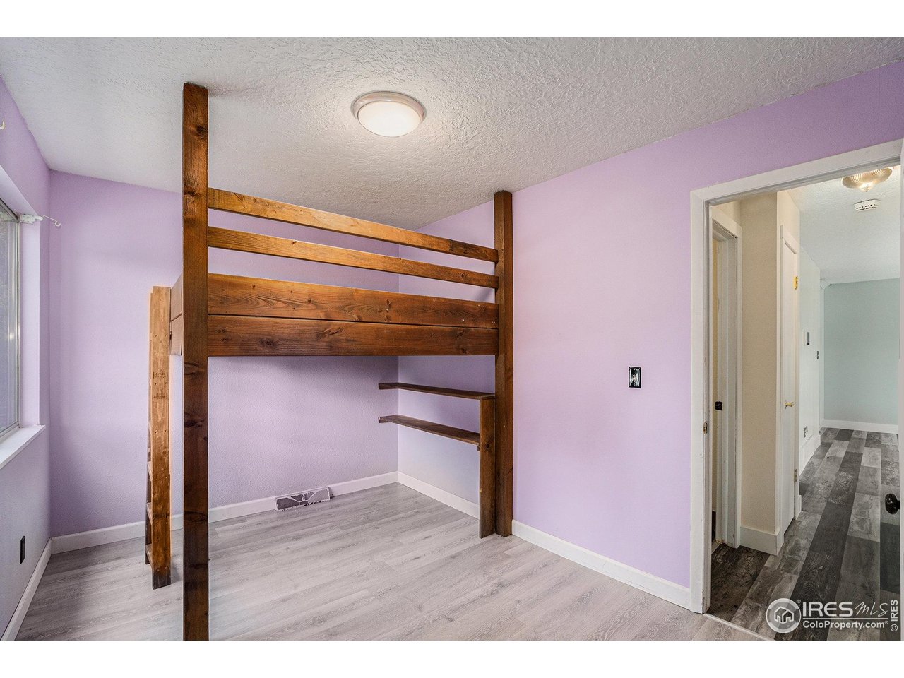 1240 3rd Street Eaton, CO 80615 - Photo 12 of 24 a view of entryway with wooden floor