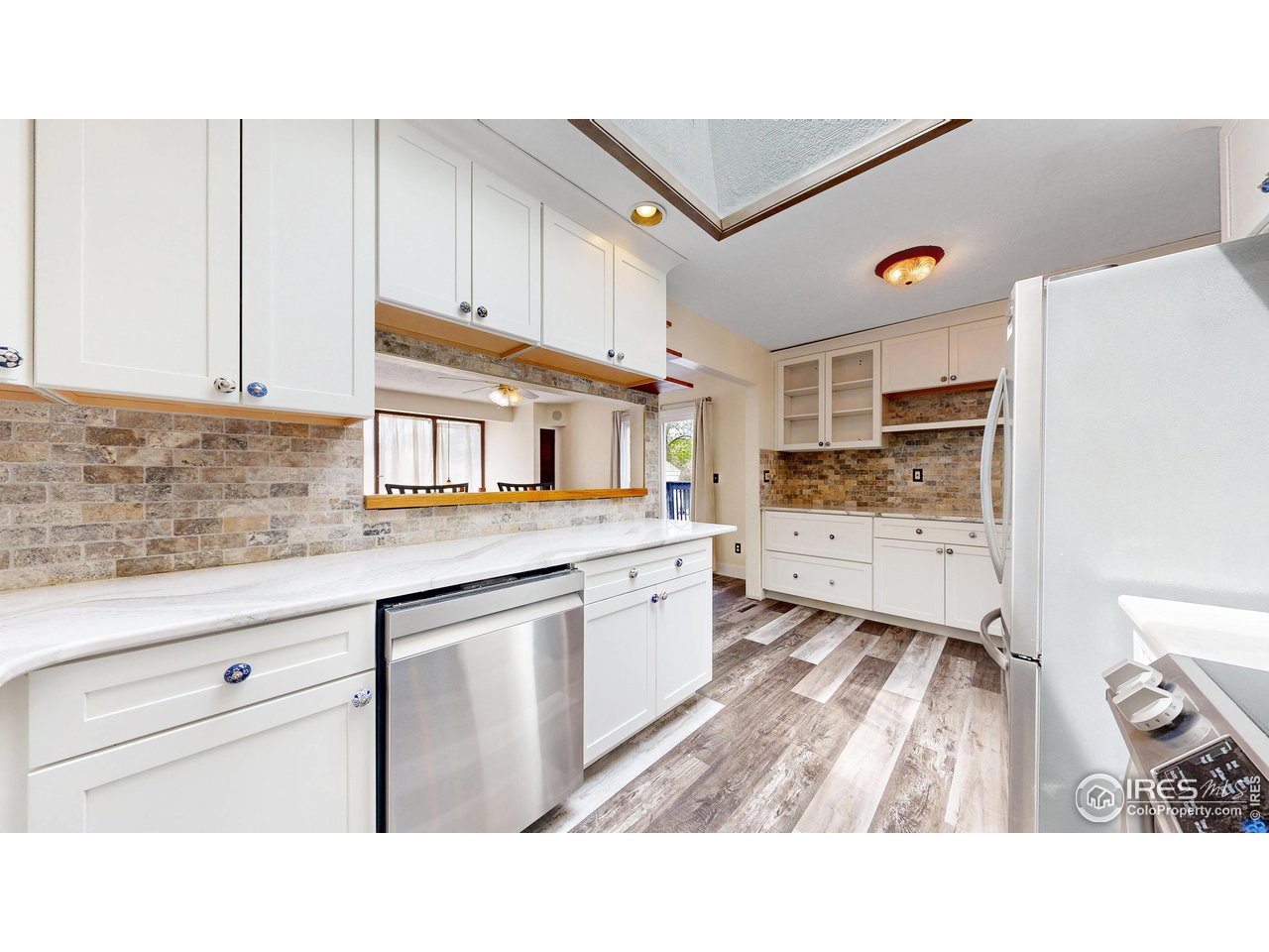 1240 3rd Street Eaton, CO 80615 - Photo 6 of 24 a kitchen with appliances and cabinets