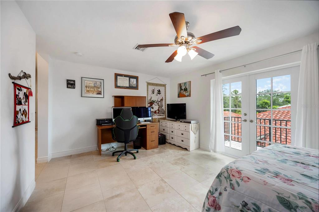 3674 Roslyn Road Venice, FL 34293 - Photo 48 of 72 a view of a livingroom with workspace and a window