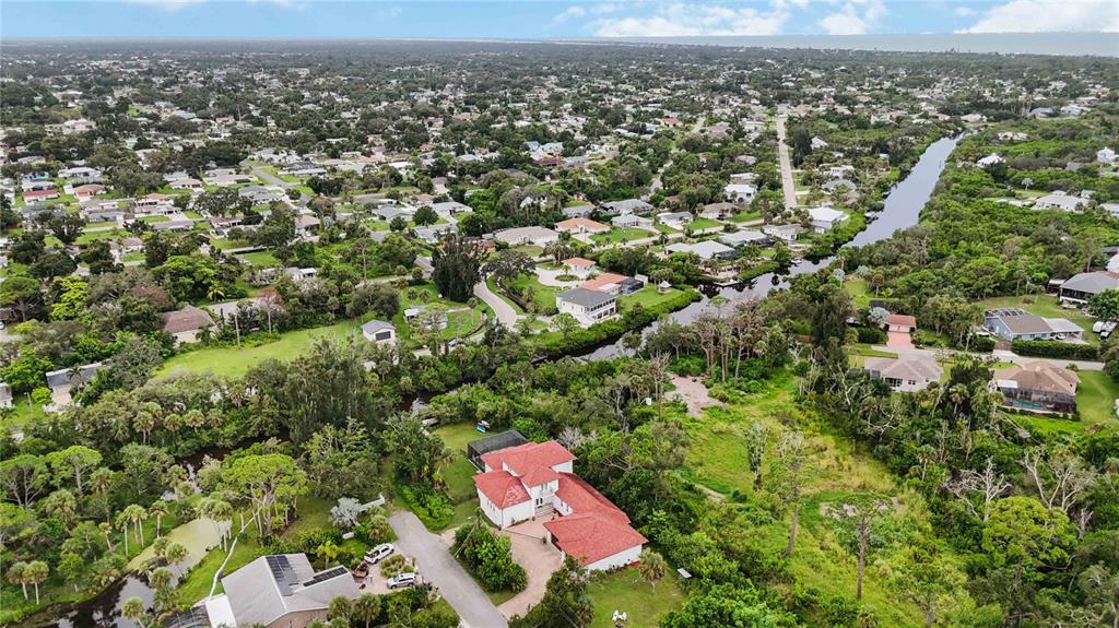 3674 Roslyn Road Venice, FL 34293 - Photo 62 of 72 an aerial view of residential houses with city view