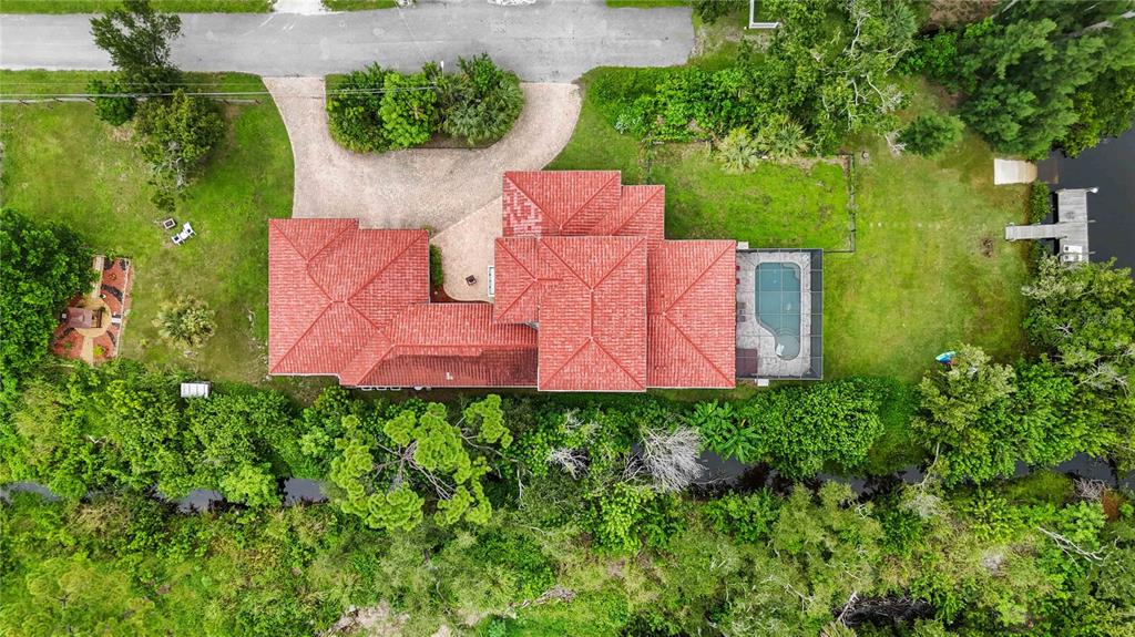 3674 Roslyn Road Venice, FL 34293 - Photo 69 of 72 an aerial view of a house with pool outdoor seating and yard