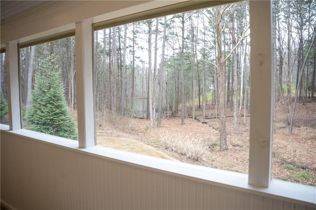 151 Cherokee Point Drive Canton, GA 30114 - Photo 137 of 163 a view of a room with a large window and tree