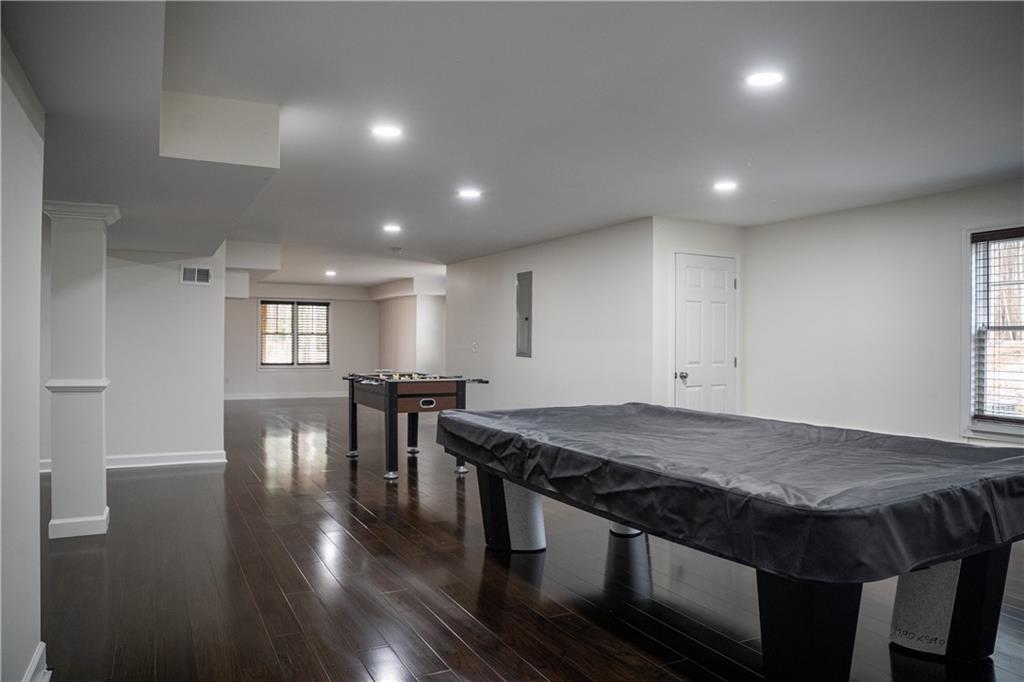 151 Cherokee Point Drive Canton, GA 30114 - Photo 154 of 163 a kitchen with stainless steel appliances granite countertop a stove a sink and a refrigerator