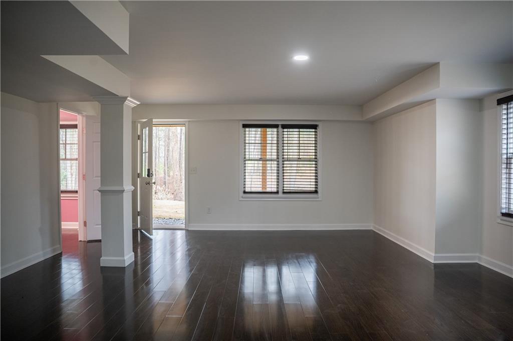 151 Cherokee Point Drive Canton, GA 30114 - Photo 159 of 163 wooden floor in an empty room with a window