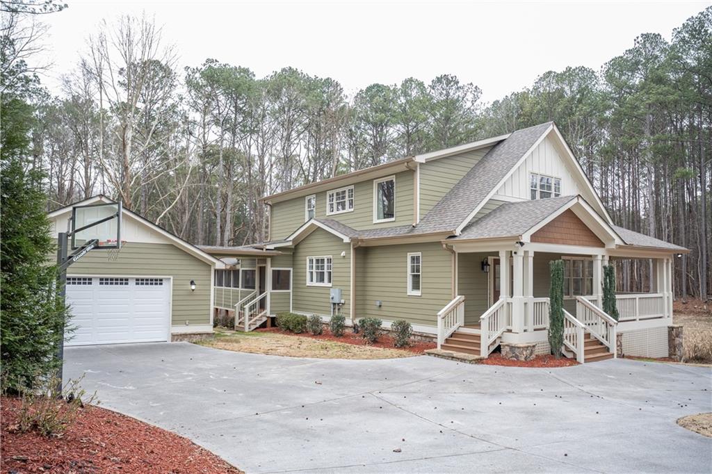 151 Cherokee Point Drive Canton, GA 30114 - Photo 17 of 163 a front view of a house with patio