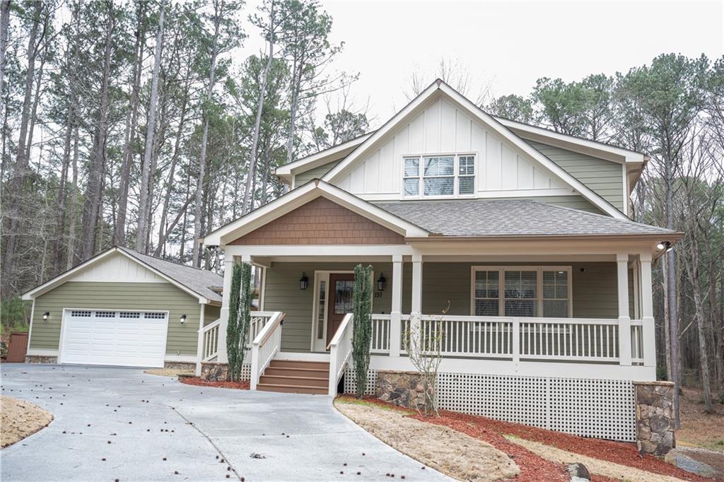 151 Cherokee Point Drive Canton, GA 30114 - Photo 4 of 163 a front view of a house with a yard