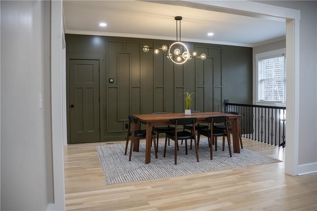 151 Cherokee Point Drive Canton, GA 30114 - Photo 83 of 163 a view of a dining room with furniture and chandelier