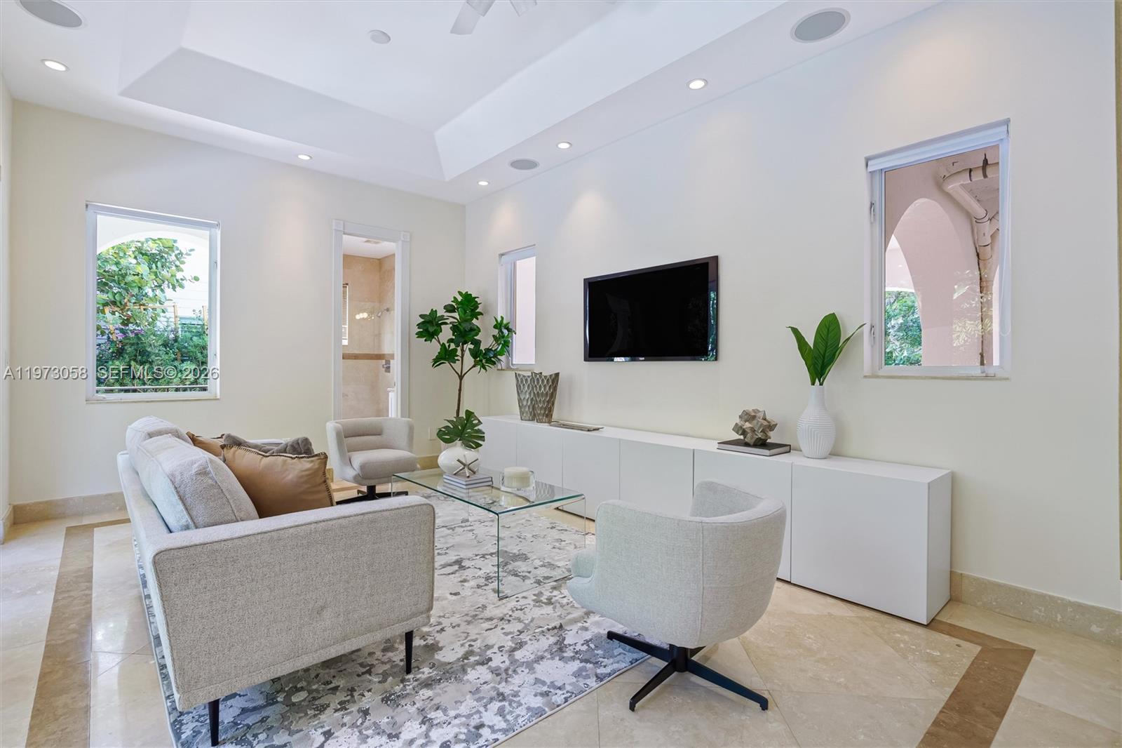 541 South Mashta Drive Key Biscayne, FL 33149 - Photo 12 of 28 a living room with furniture and a flat screen tv