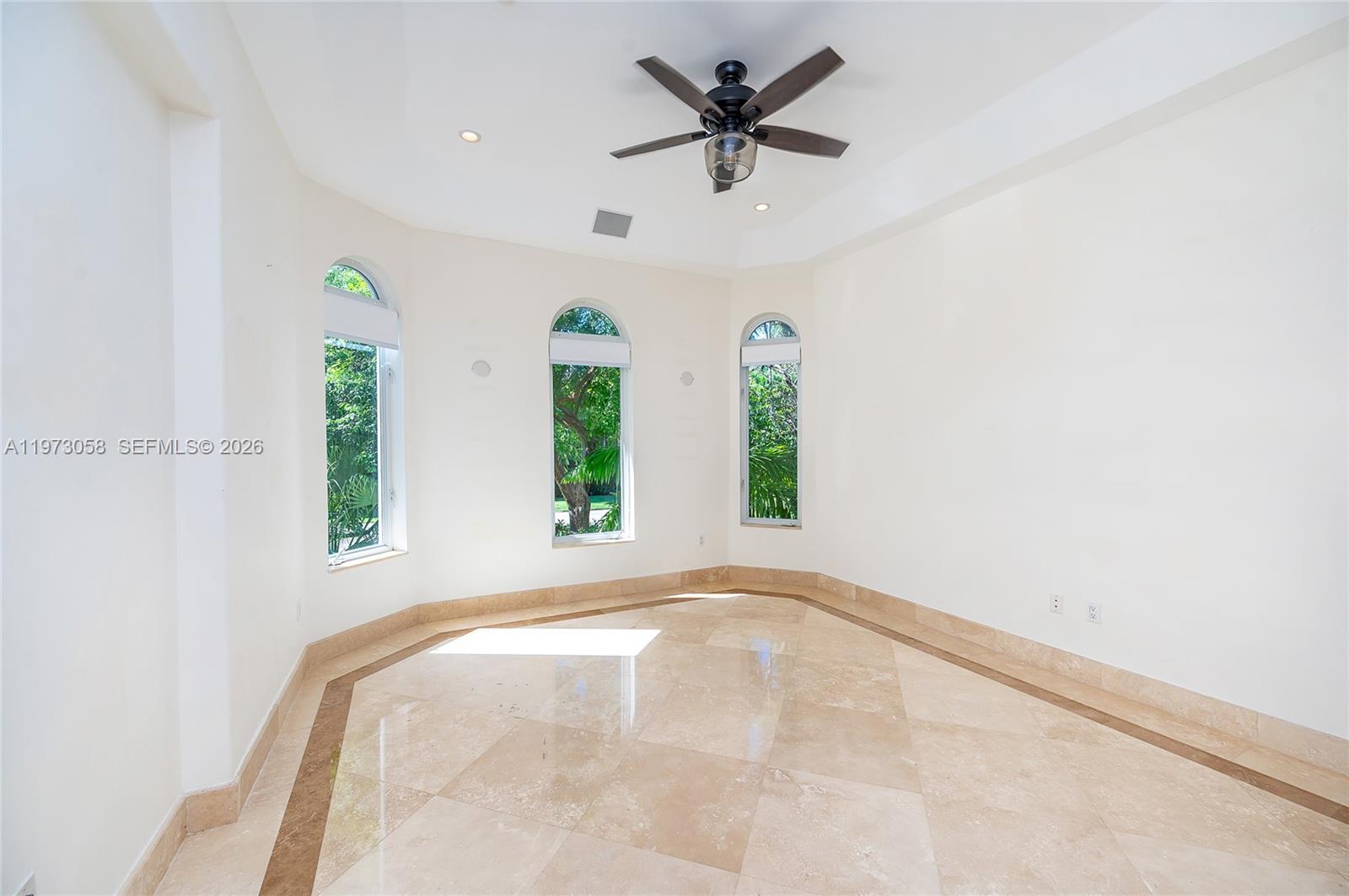 541 South Mashta Drive Key Biscayne, FL 33149 - Photo 14 of 28 a view of room with window and ceiling fan