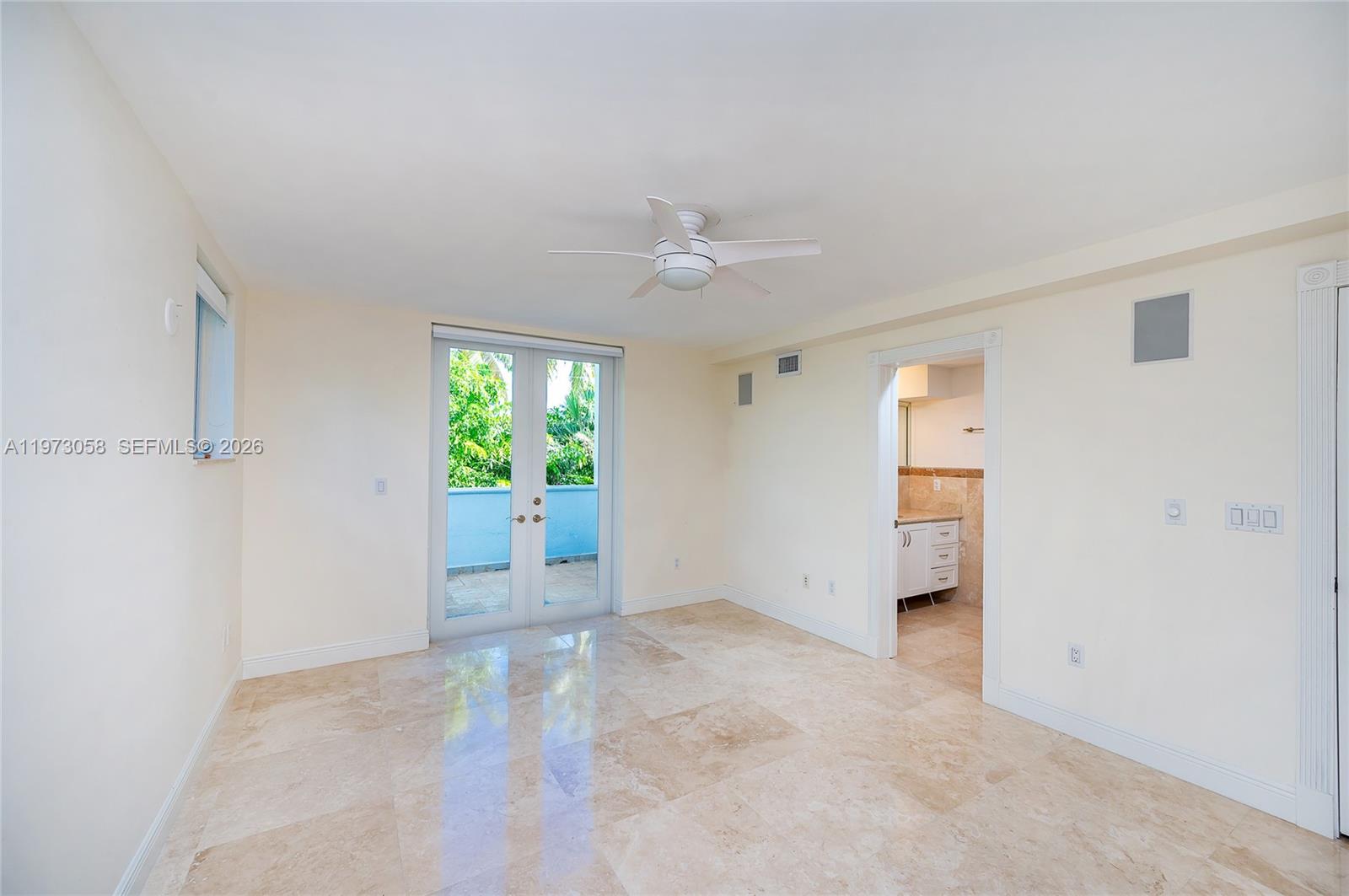 541 South Mashta Drive Key Biscayne, FL 33149 - Photo 19 of 28 an empty room with windows and closet