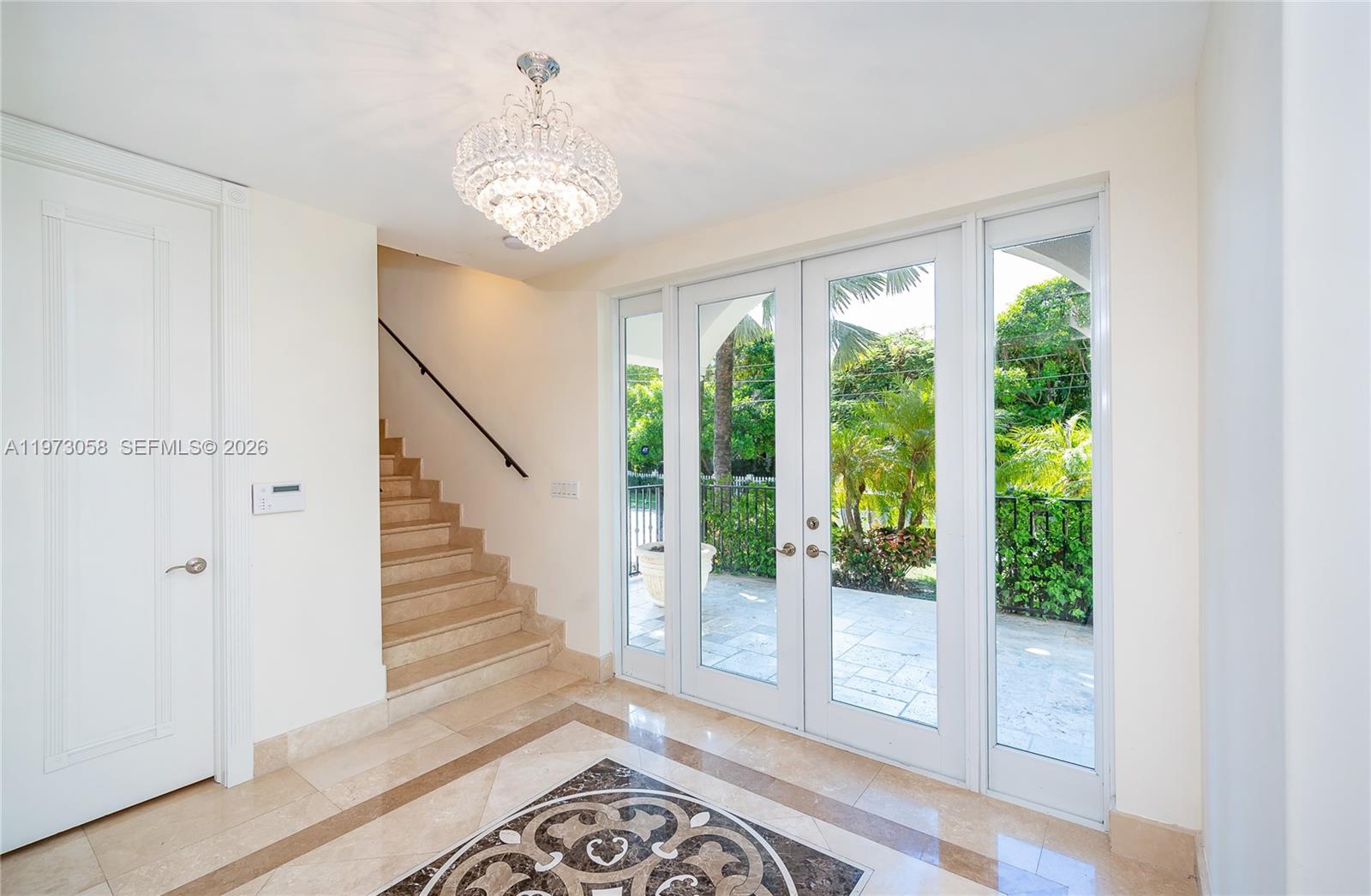 541 South Mashta Drive Key Biscayne, FL 33149 - Photo 5 of 28 a view of an entryway with wooden floor