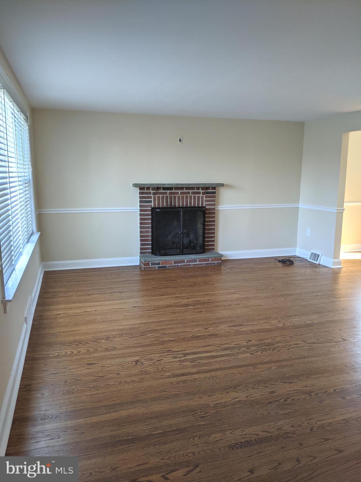126 Fairfield Lane Wayne, PA 19087 - Photo 4 of 17 Decorative brick fireplace
