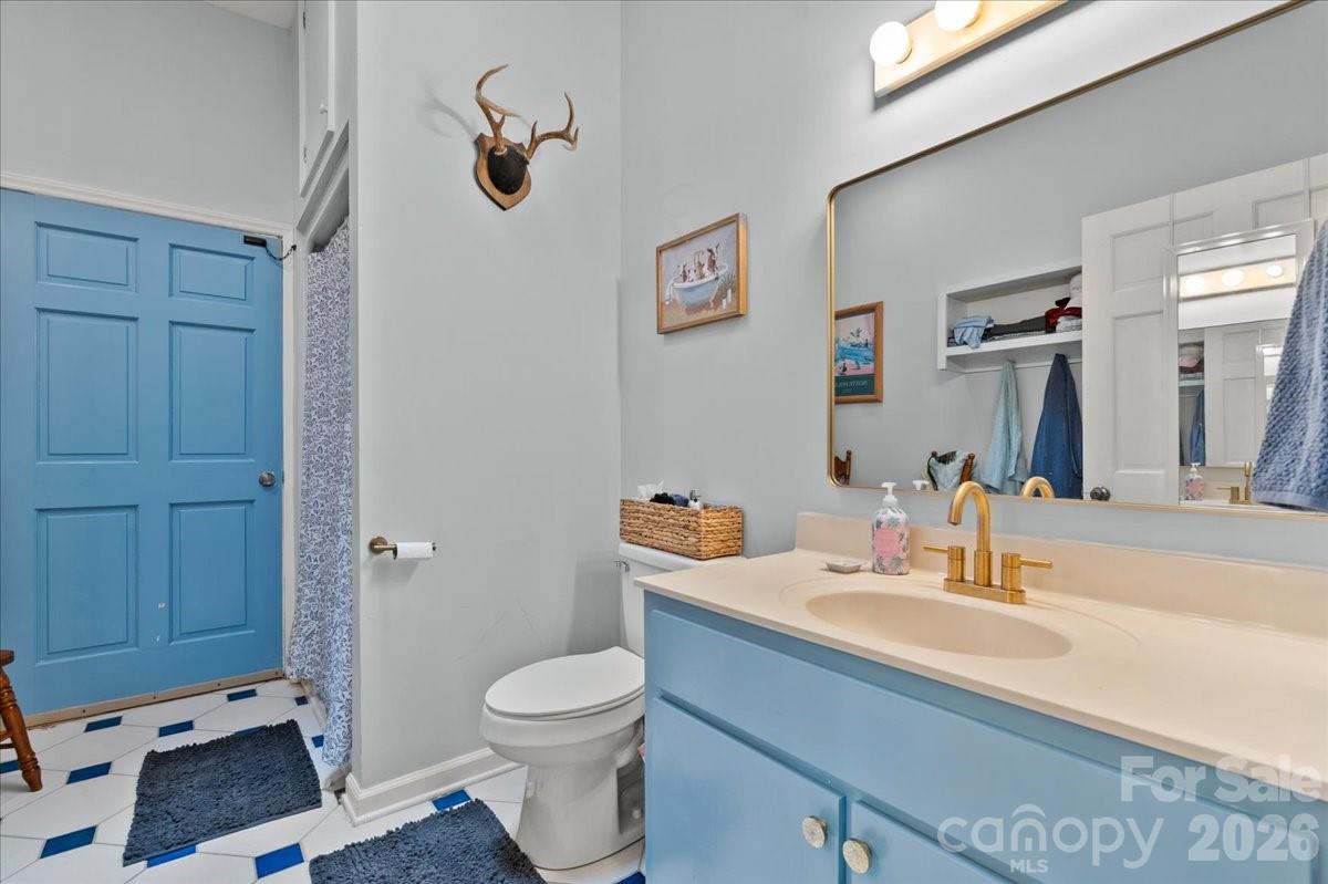 209 Fairway Road Cheraw, SC 29520 - Photo 41 of 48 a bathroom with a sink a toilet and shower