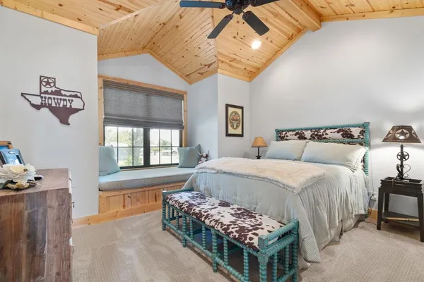 a bed room with a bed and a couch