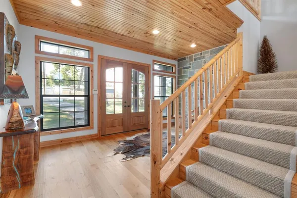 a view of entryway livingroom and hall