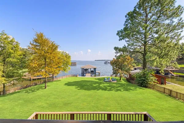 a view of a house with a back yard