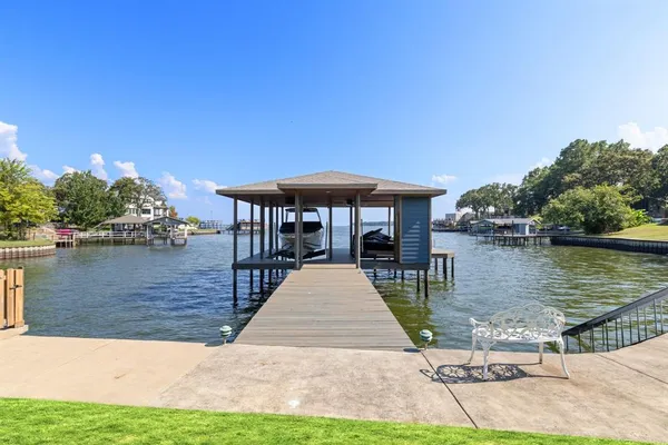 a view of a swimming pool with a chairs