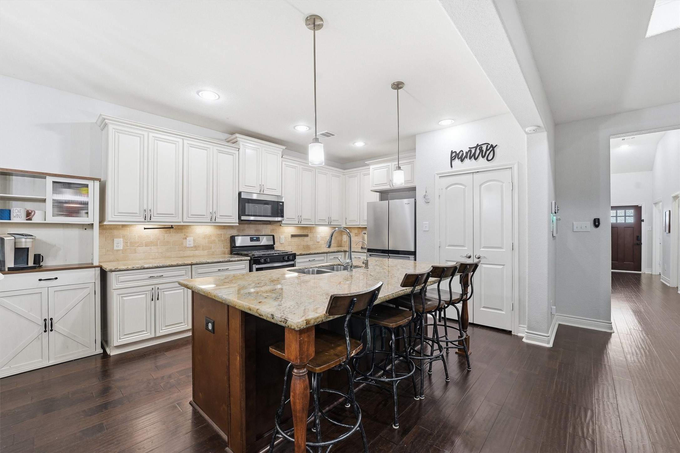 205 Kingspoint Conroe, TX 77356 - Photo 6 of 29 Kitchen with breakfast island