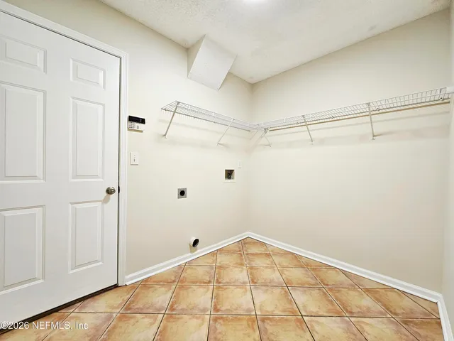 a view of a room with an empty space