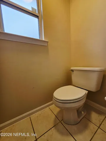 a bathroom with a toilet