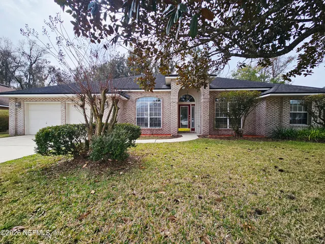 front view of a house with a small yard