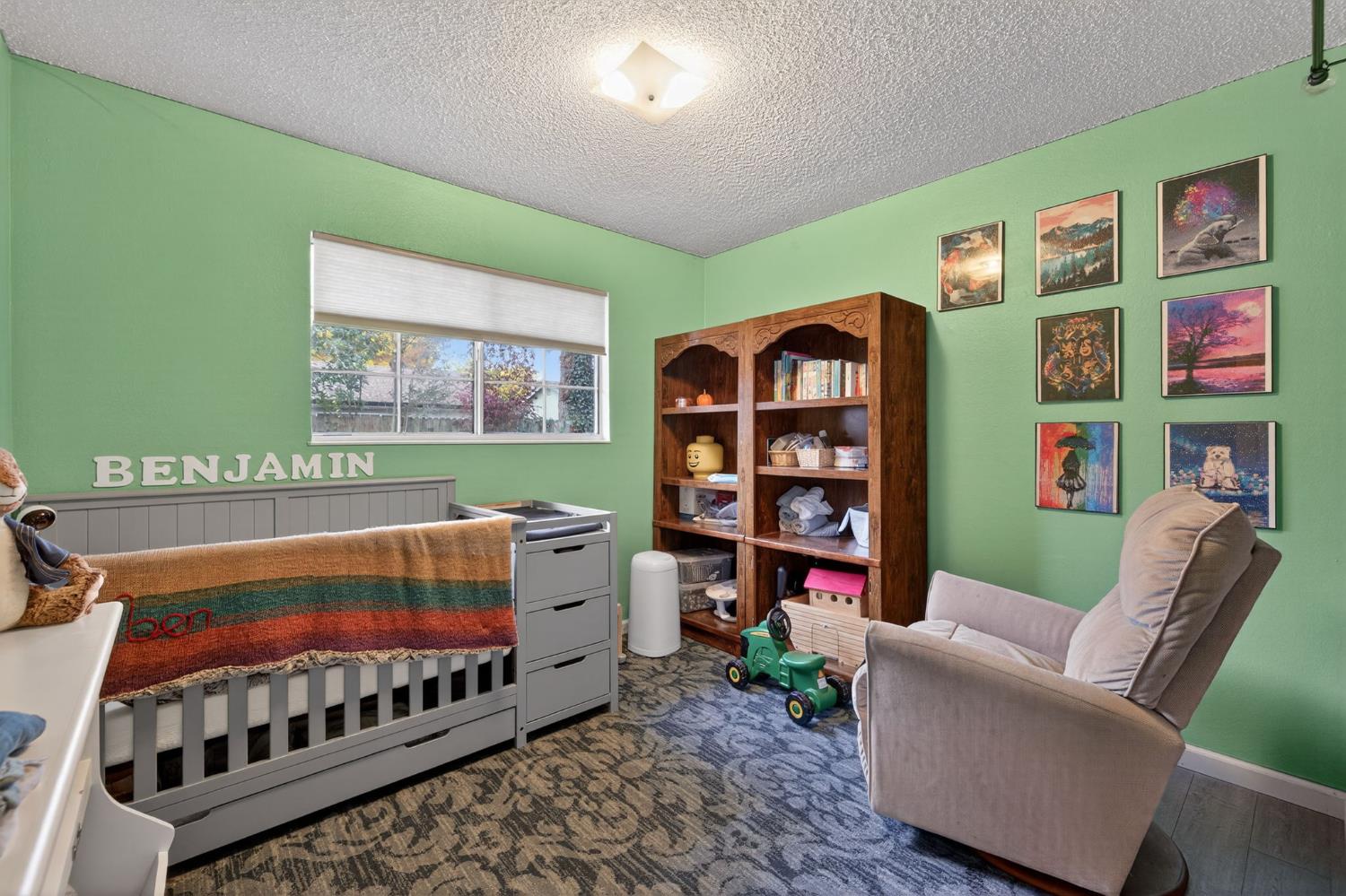 6816 Tareyton Way Citrus Heights, CA 95621 - Photo 13 of 46 a bedroom with furniture and a baby crib