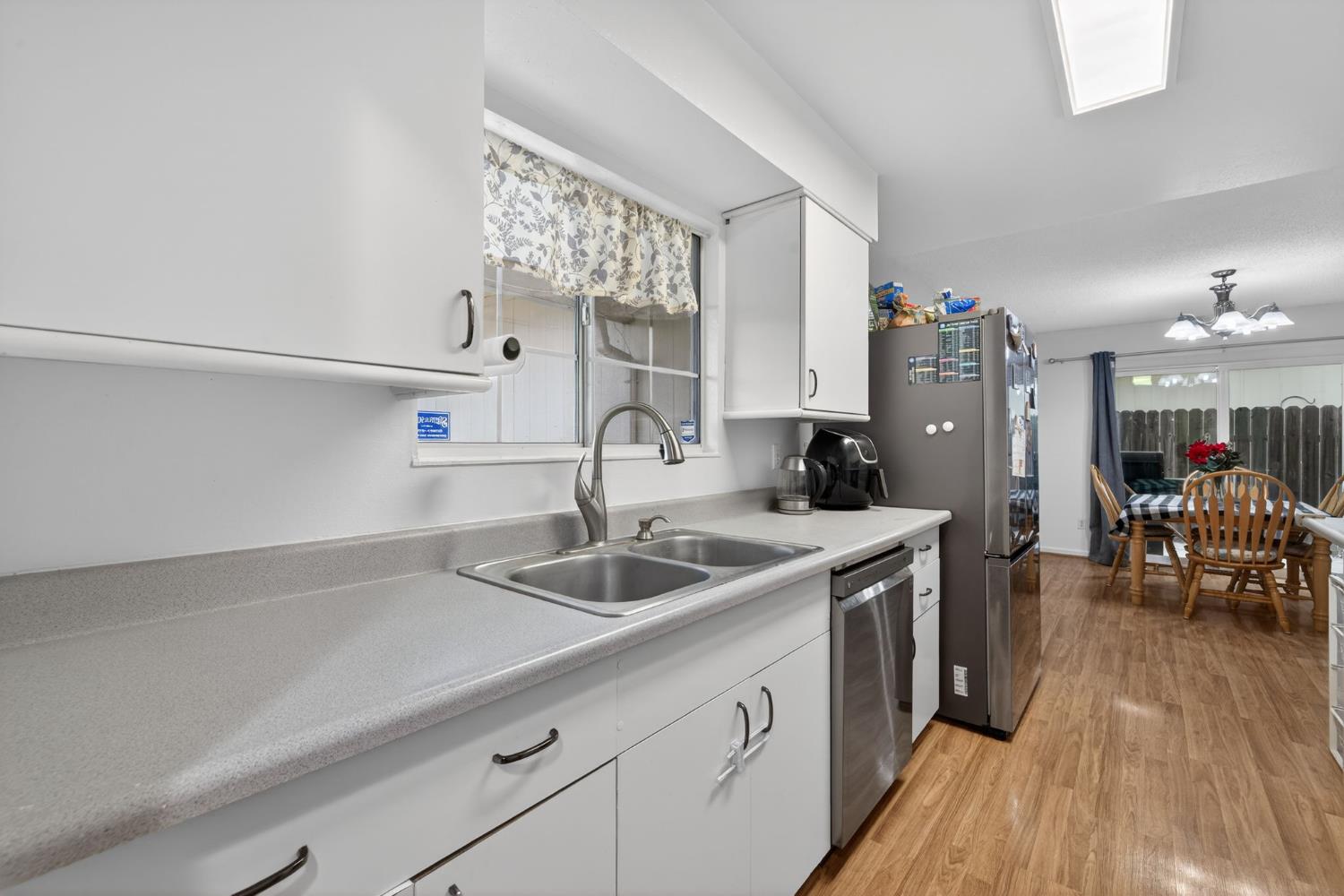 6816 Tareyton Way Citrus Heights, CA 95621 - Photo 18 of 46 a kitchen with a sink and cabinets