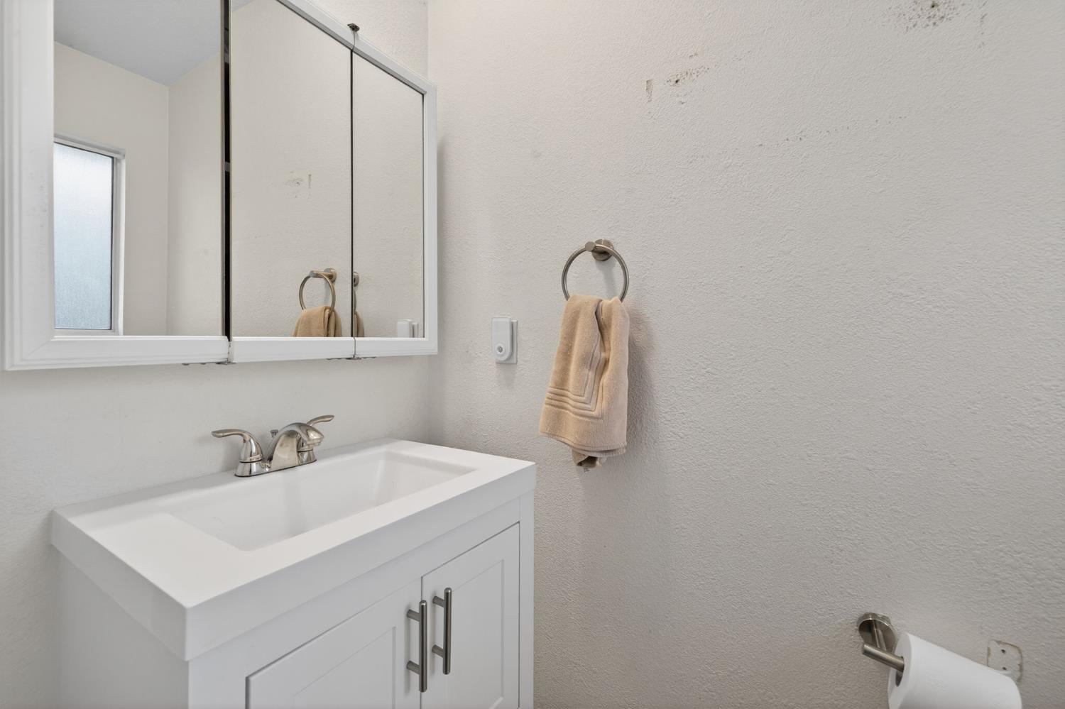 6816 Tareyton Way Citrus Heights, CA 95621 - Photo 26 of 46 a bathroom with a sink vanity and a mirror